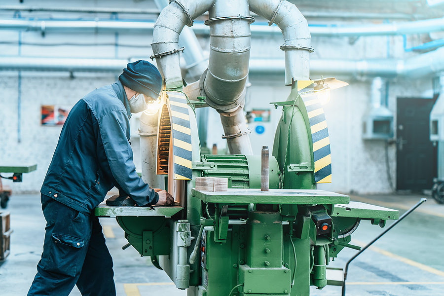 Worker in manufacturing plant